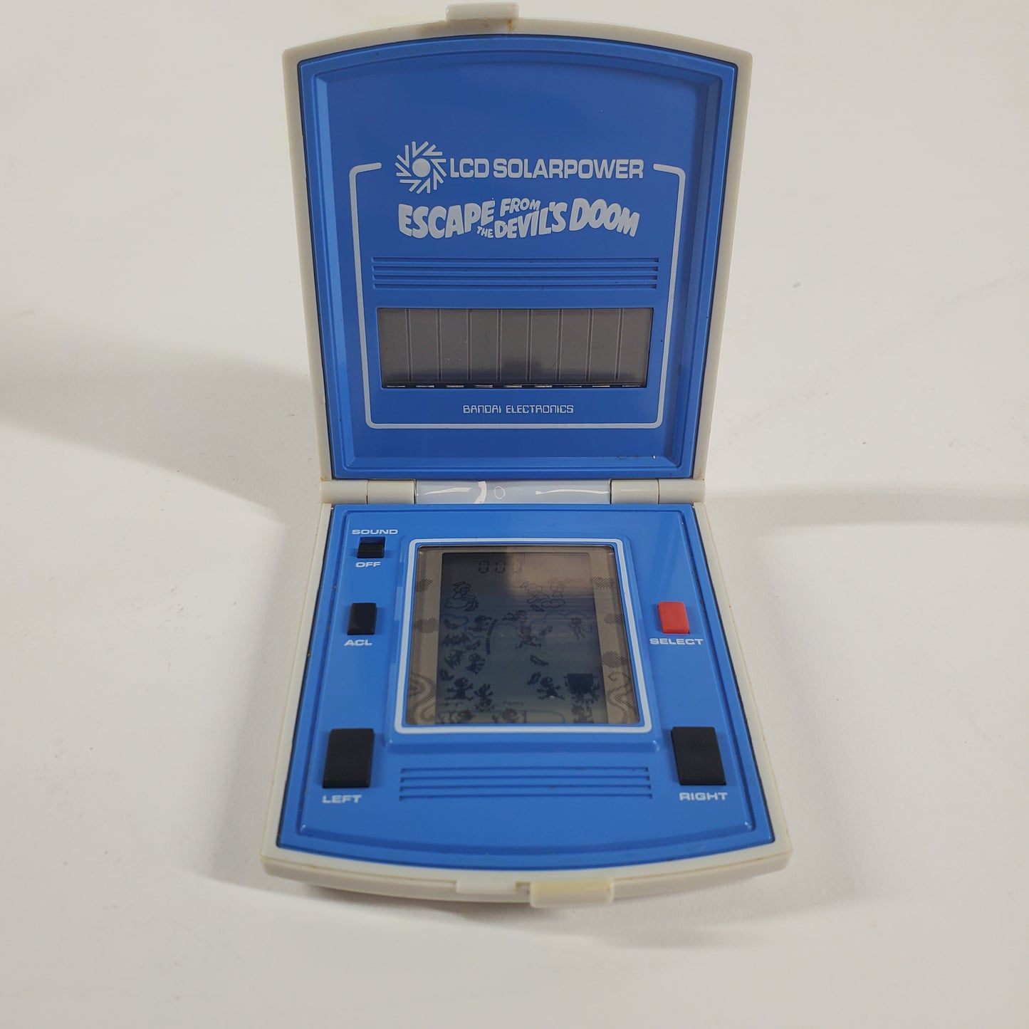 Bandai Electronics Escape from the devils room Handheld Electronic Game 8208